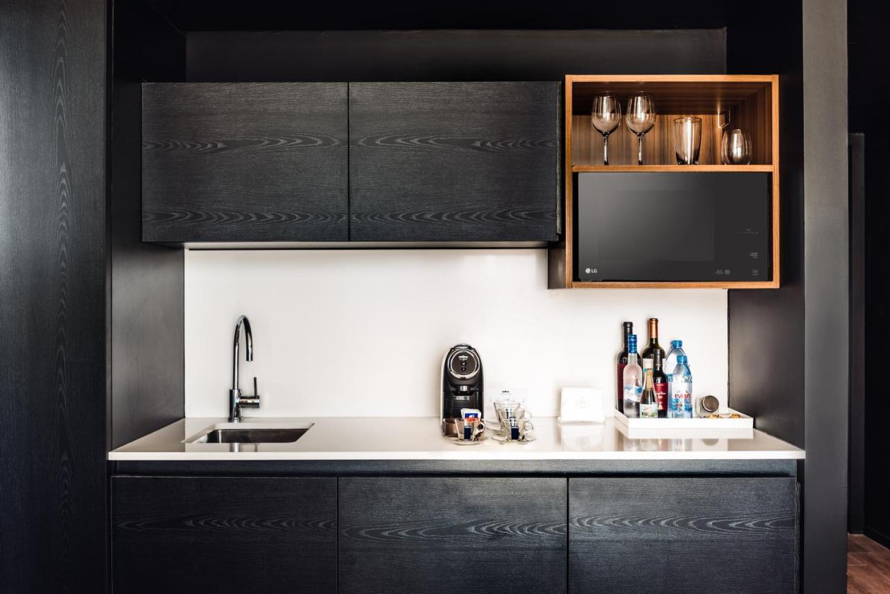 Sls Buenos Aires Puerto Madero Hotel Exterior photo A wet bar in a hotel room